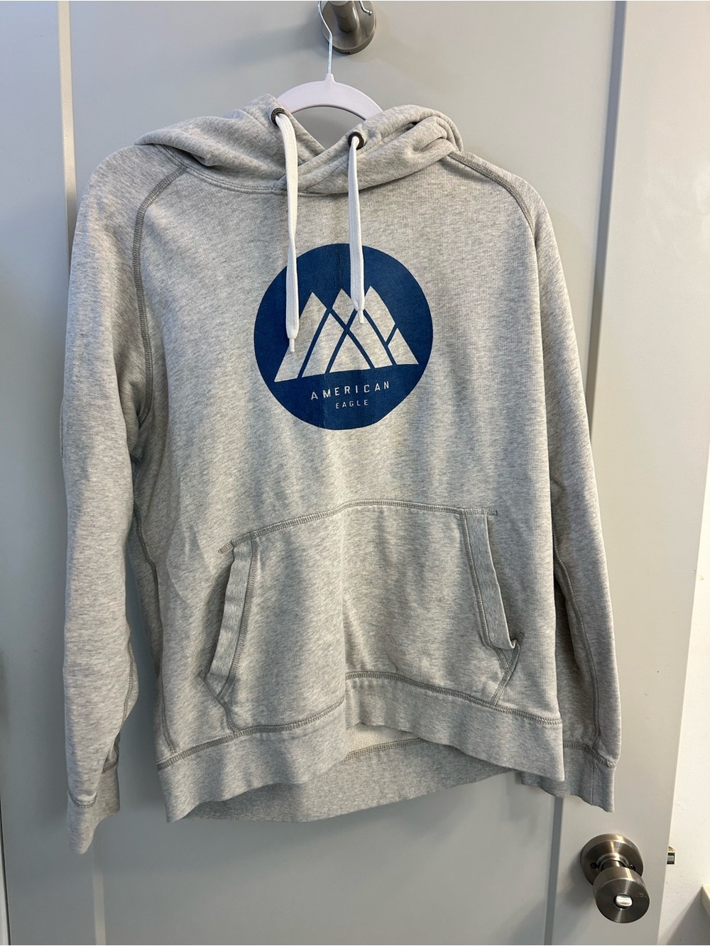 American Eagle Outfitters Light Gray Hoodie with Navy Logo